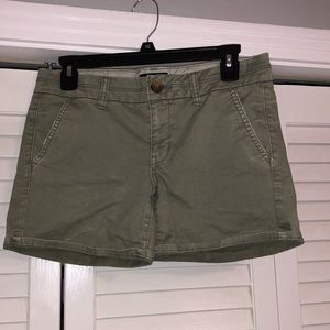 green shorts